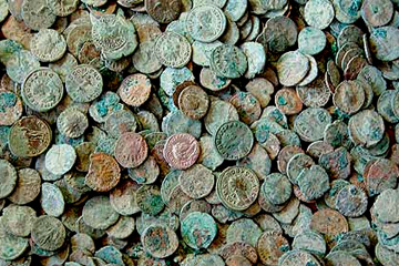 Some of the 52,503 coins discovered in a clay jar by Dave Crisp.