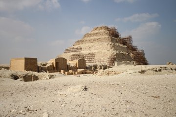 The Step Pyramid of Saqqara surrounded by scaffolding.
