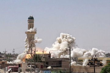 Shiite mosque being destroyed in Mosul