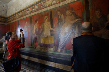 Tourists in the Villa of the Mysteries
