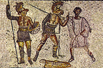 A referee stands in the background while two gladiators fight.